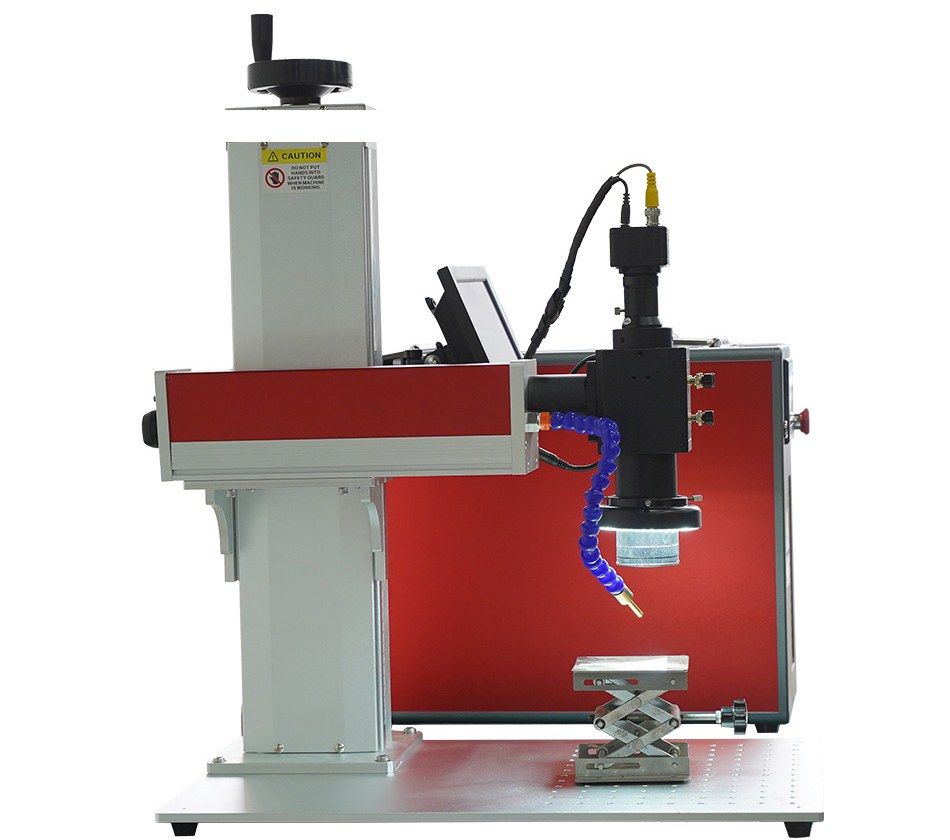 Split QCW fiber jewelry laser welder: welding stand with CCD camera, monitor and lift table beside the red laser cabinet