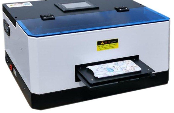 A5 UV flatbed printer with blue tinted lid and a printed phone case on the tray