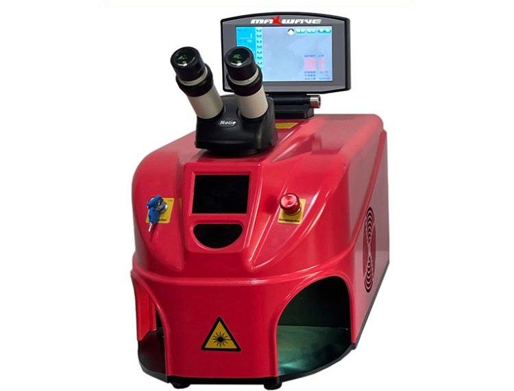 Red desktop integrated jewelry laser welder with binocular microscope, top-mounted display, key switch and emergency stop
