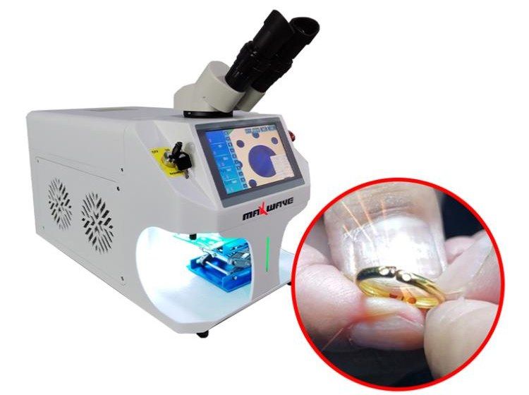 Three-quarter view of the all-in-one desktop jewelry welder, with an inset of a gold ring being laser welded