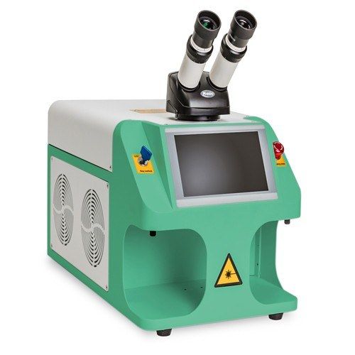 Mini jewelry laser welder in a green cabinet with microscope, screen and side cooling fans