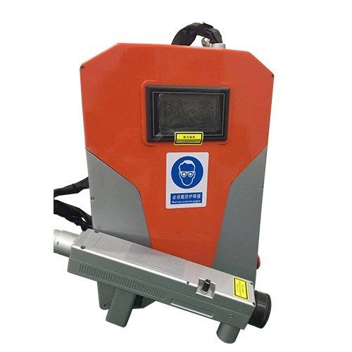 MW-LC50 backpack housing with shoulder straps and the handheld laser cleaning head in front
