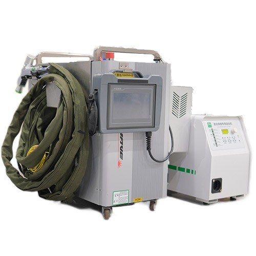 Side view of the 4-in-1 laser machine with the handheld head on top and the fiber cable in its protective sleeve, next to the wire feeder