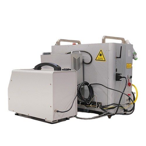 Rear view of the 4-in-1 laser machine and wire feeder showing the rear-panel connections and cabling